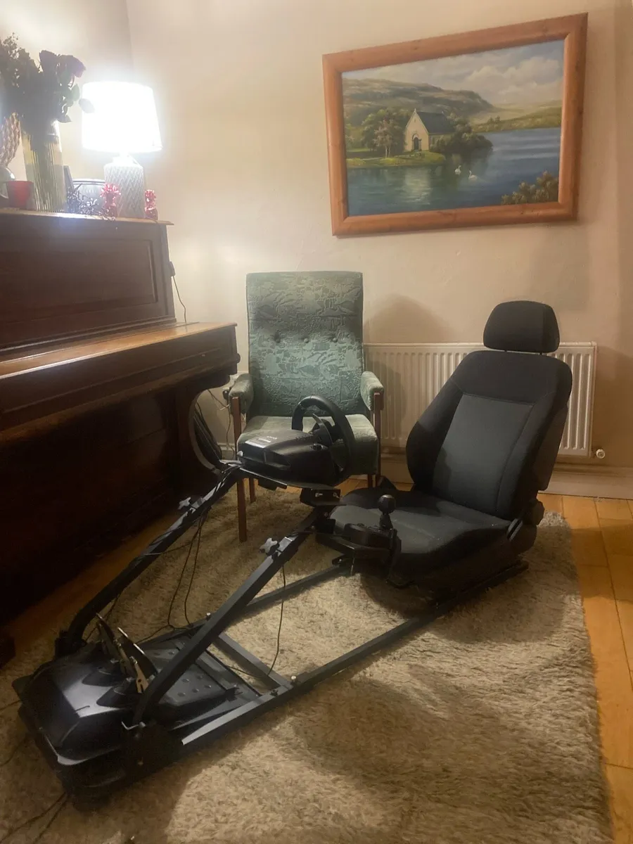 Logitech steering wheel and frame - Image 1