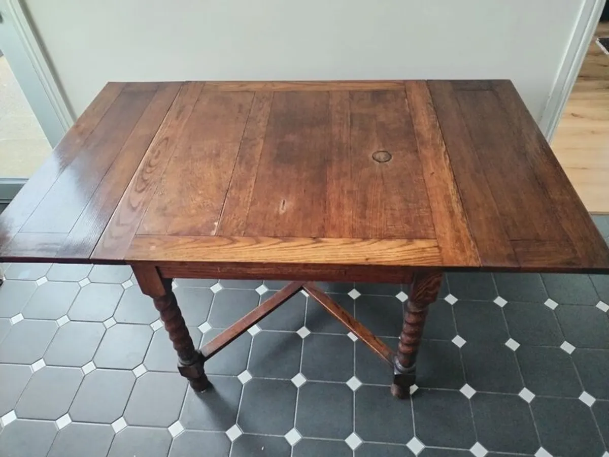 Antique Oak Extendable draw leaf dining table with barley twist legs - Image 1