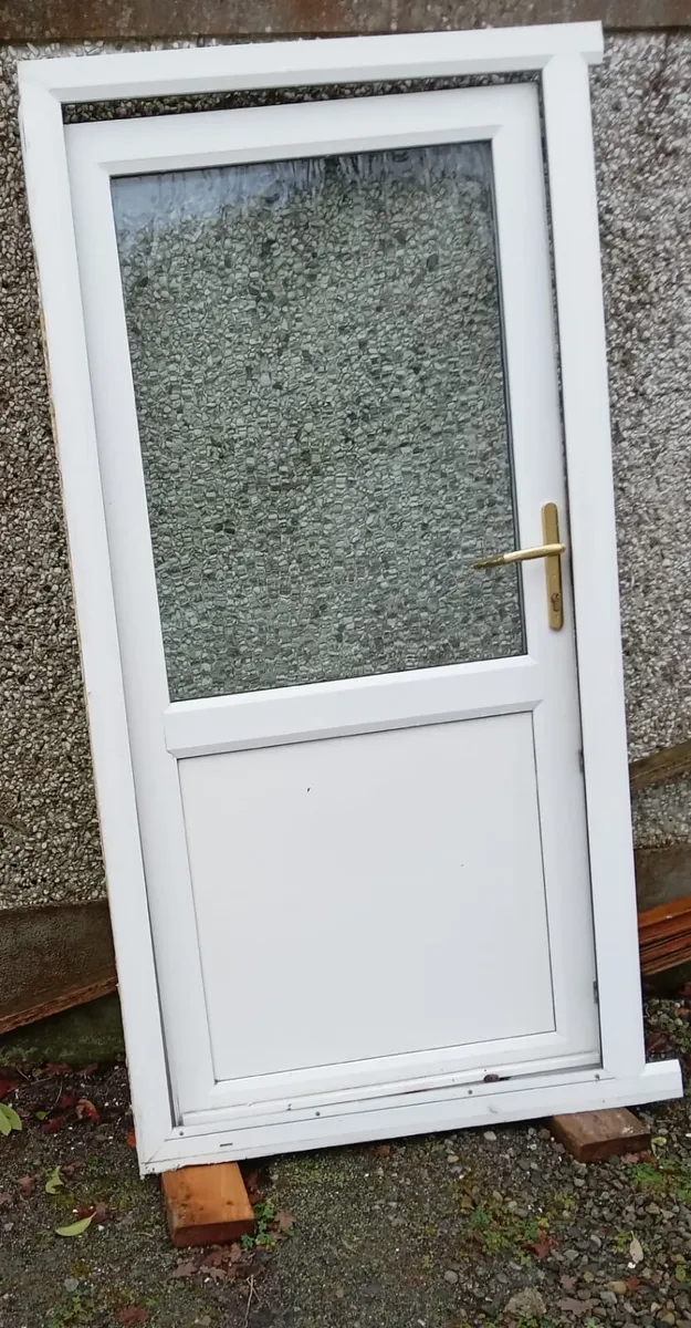 Lovely white uPVC door and matching frame