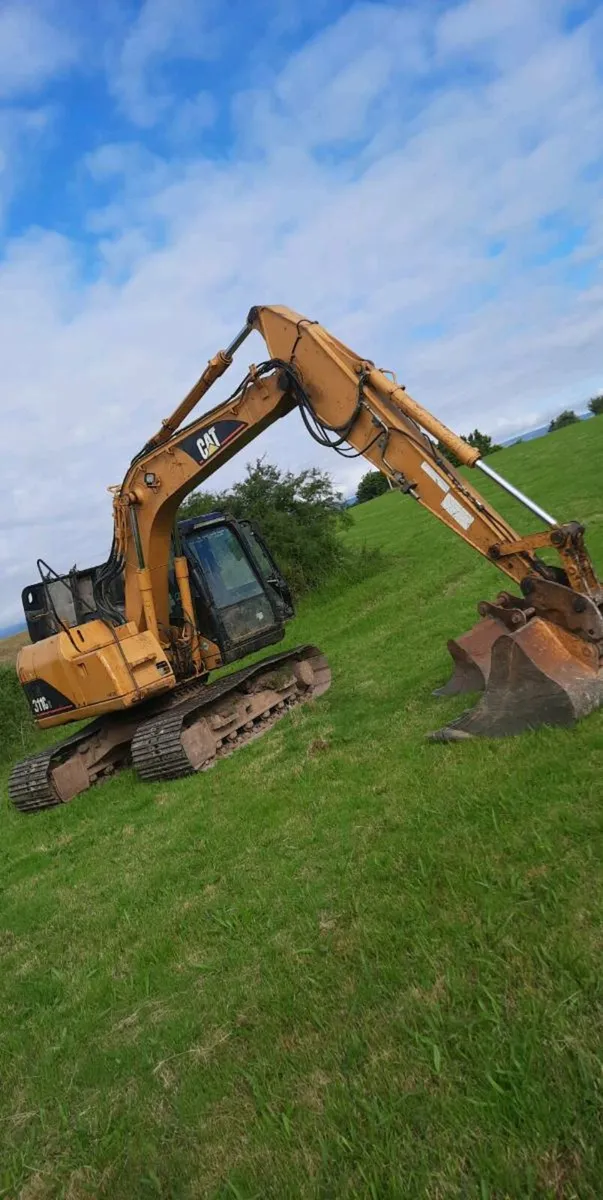 Cat 311cu - Image 1