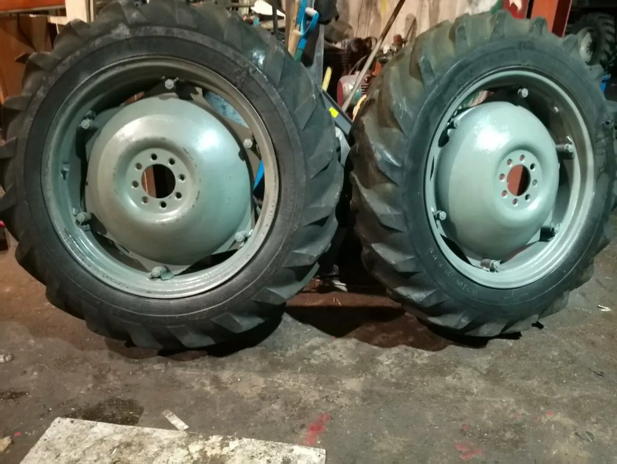 Massey wheels and tyres 12.4 28 8 stud - Image 1