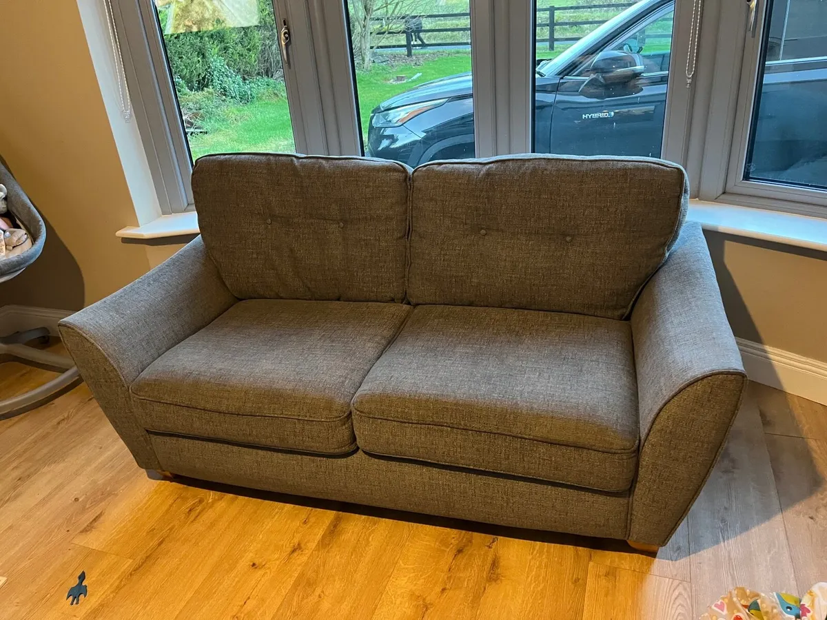 Two x two seater couches and a matching pouffe - Image 1