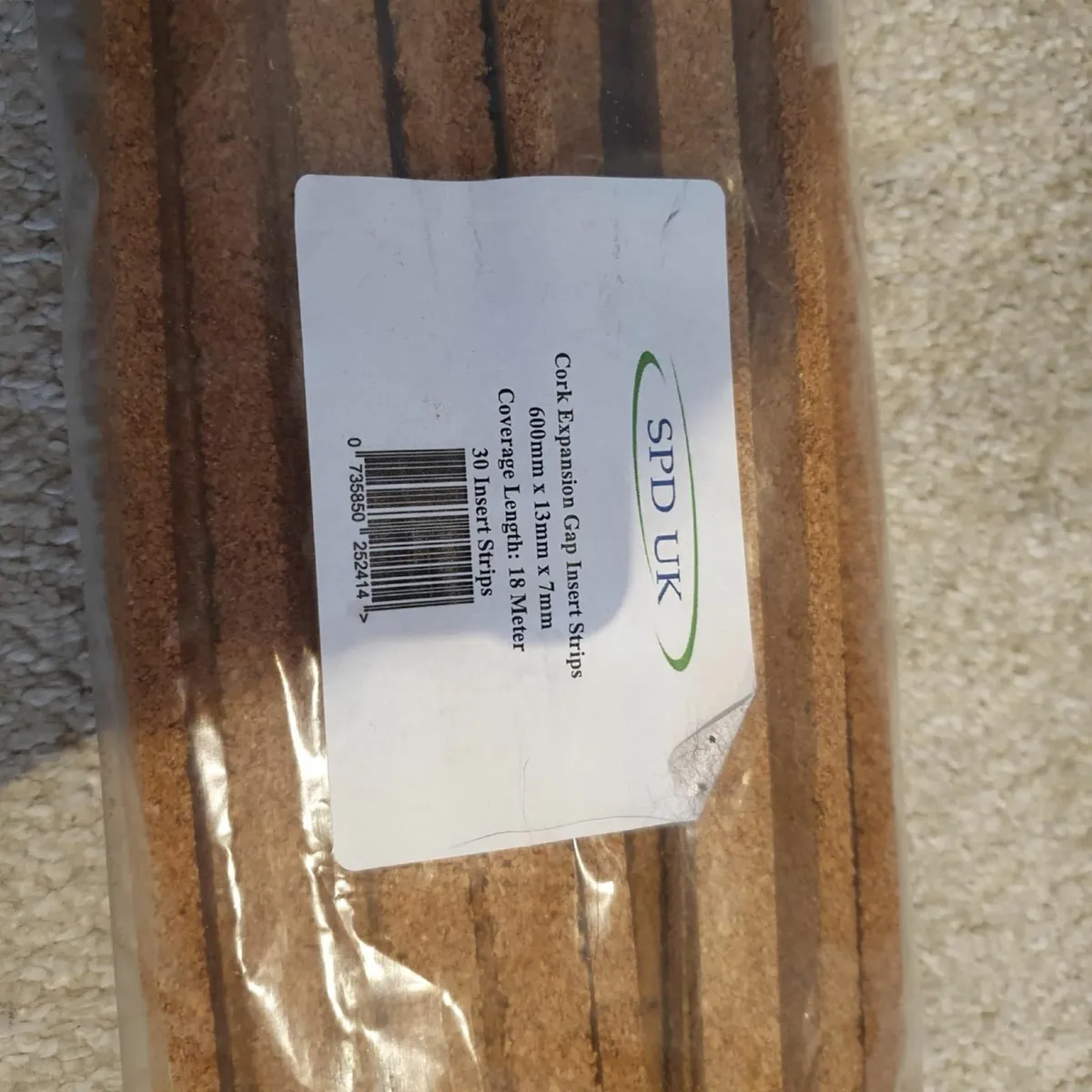 Cork expansion gap inserts