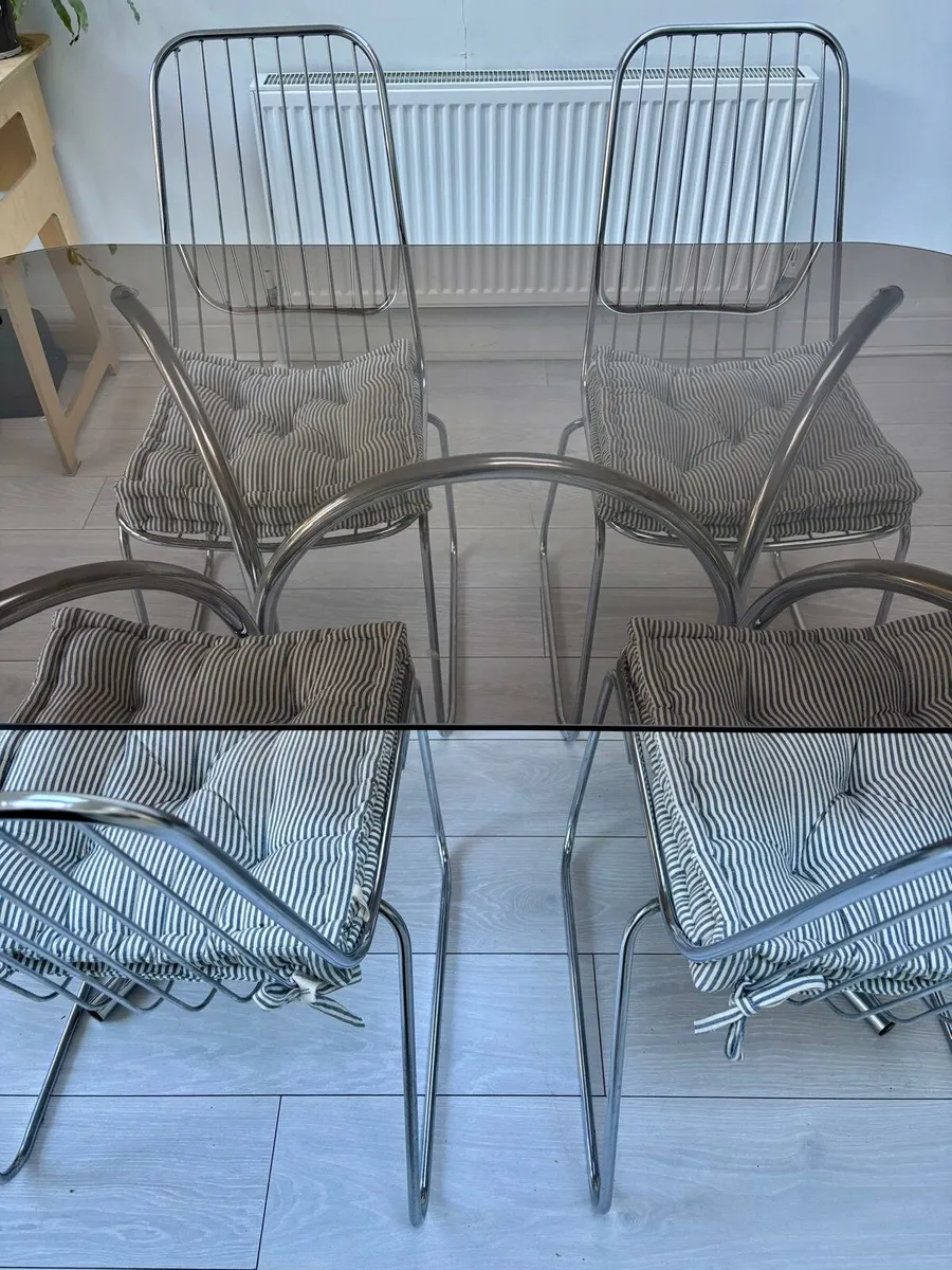 Glass dining table and chrome chairs - Image 1