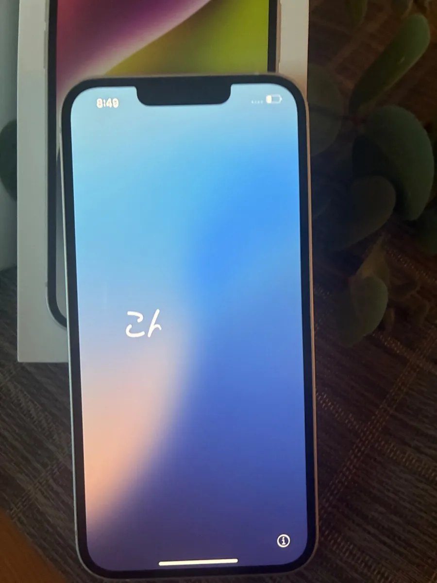 Pristine White iPhone 14 - Image 1