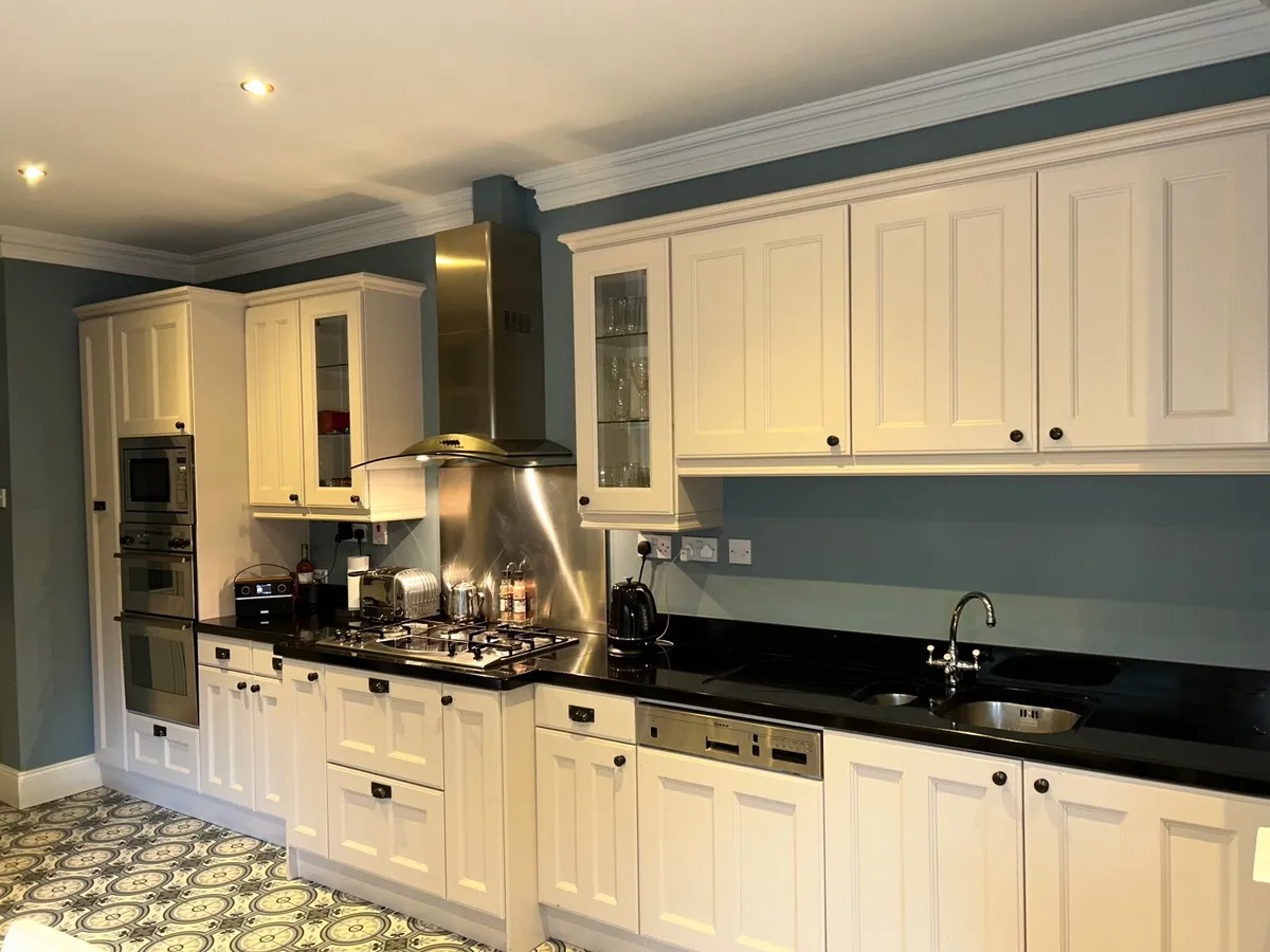 Kitchen cabinets and appliances and Dresser unit - Image 1