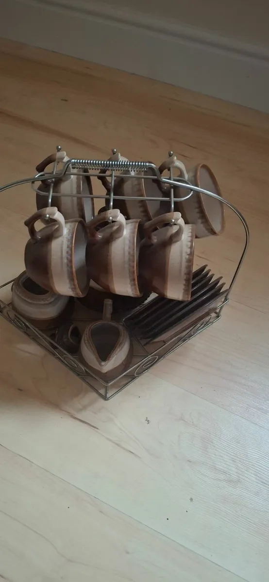 Cute set of ware in stand