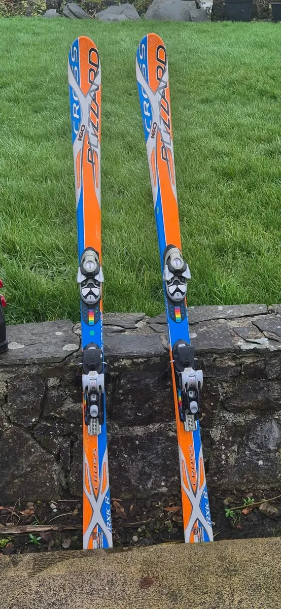 Ski Boots and Skis - Image 1