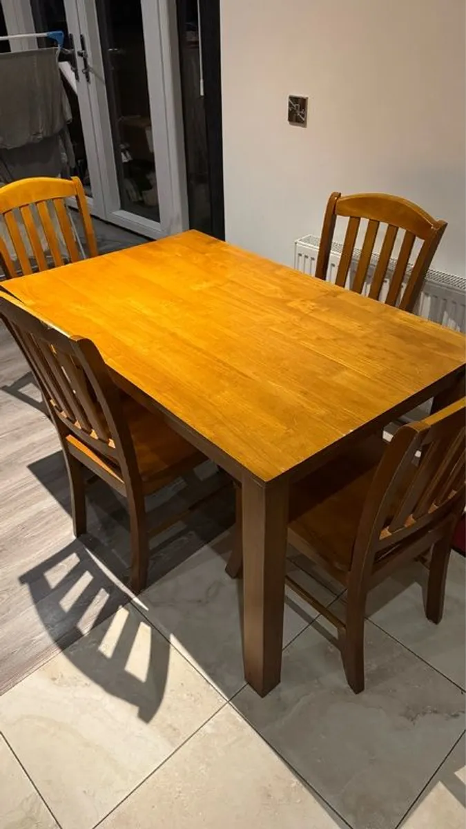 Wooden table with 4 chairs in excellent condition. - Image 1