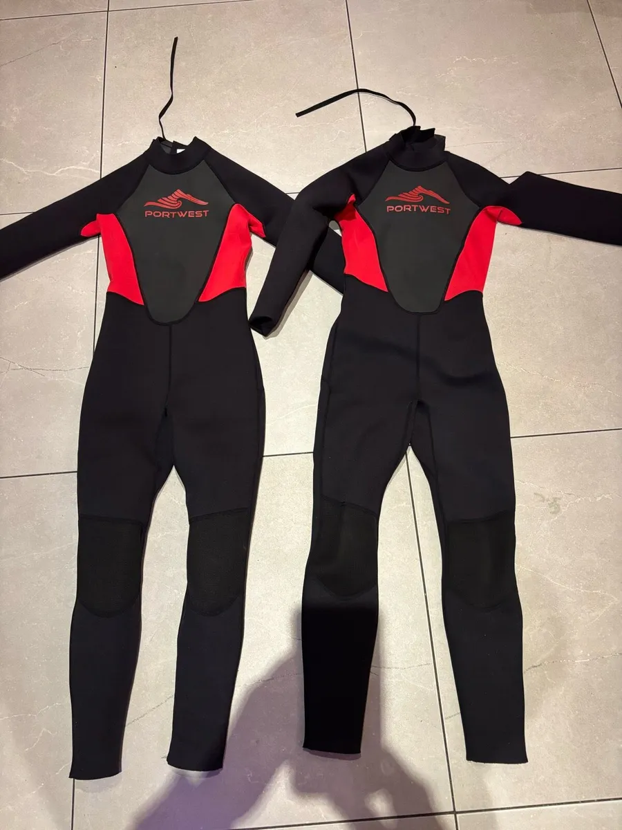 Wetsuits age 11/12 two for €45 - Image 1