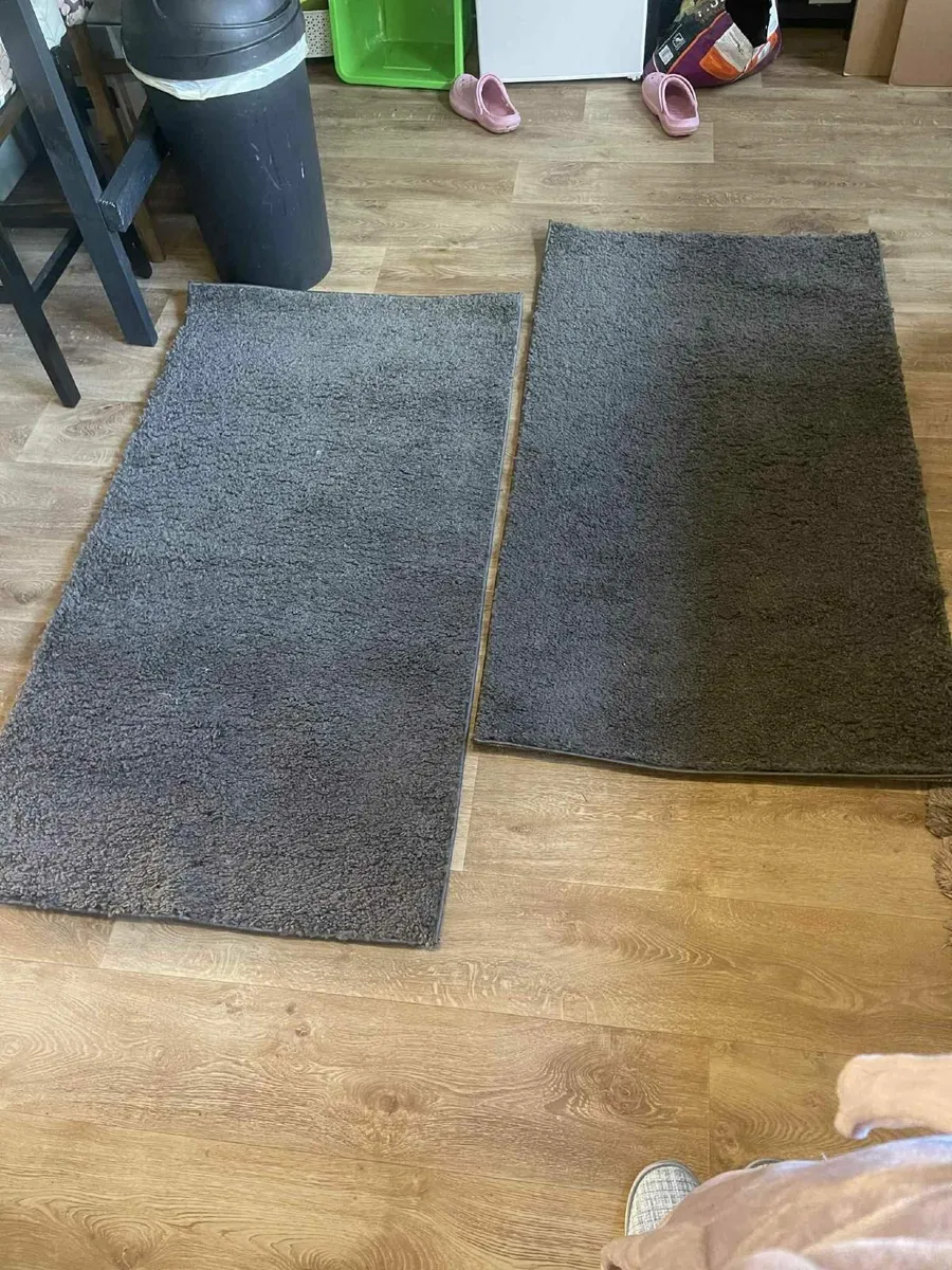 2 charcoal grey rugs  35e