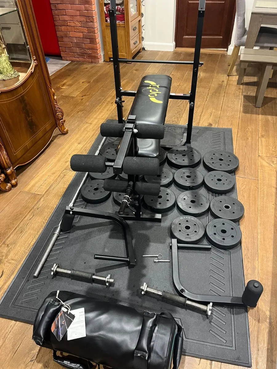 Bench, 20 kg weighted bag , barbell dumbbells and - Image 1