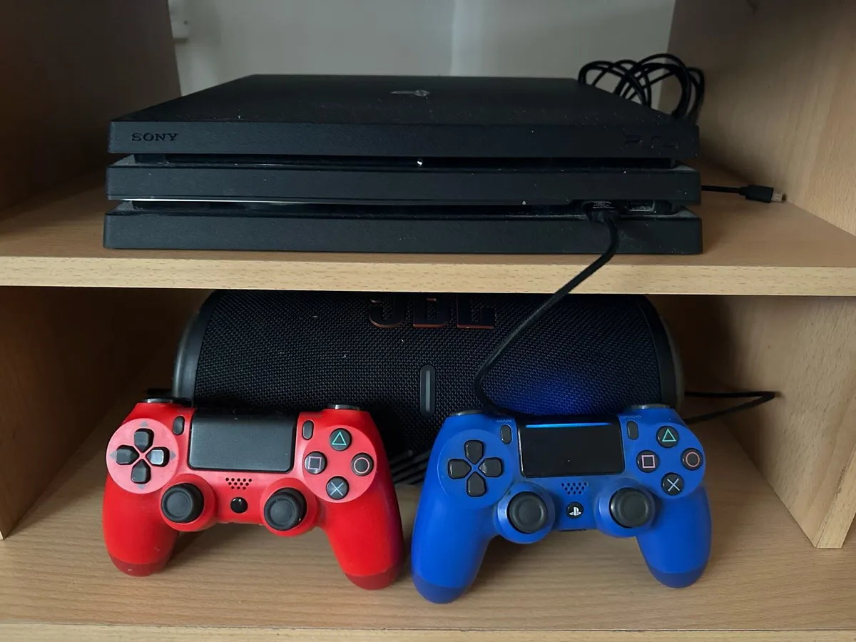 PS4 Pro 1Tb + 2 DualShock Controllers - Image 1