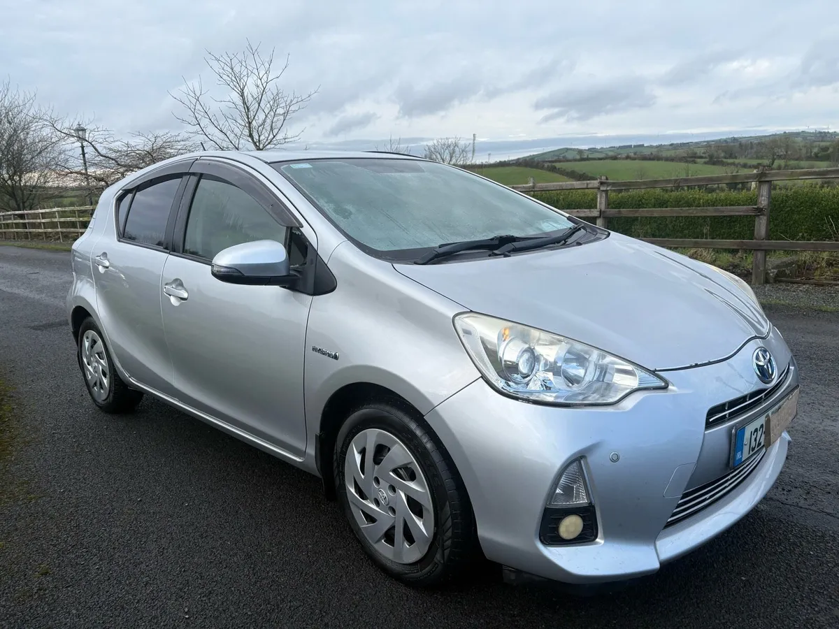 2013 Toyoto Aqua Petrol Hybrid Automatic,Driving - Image 1