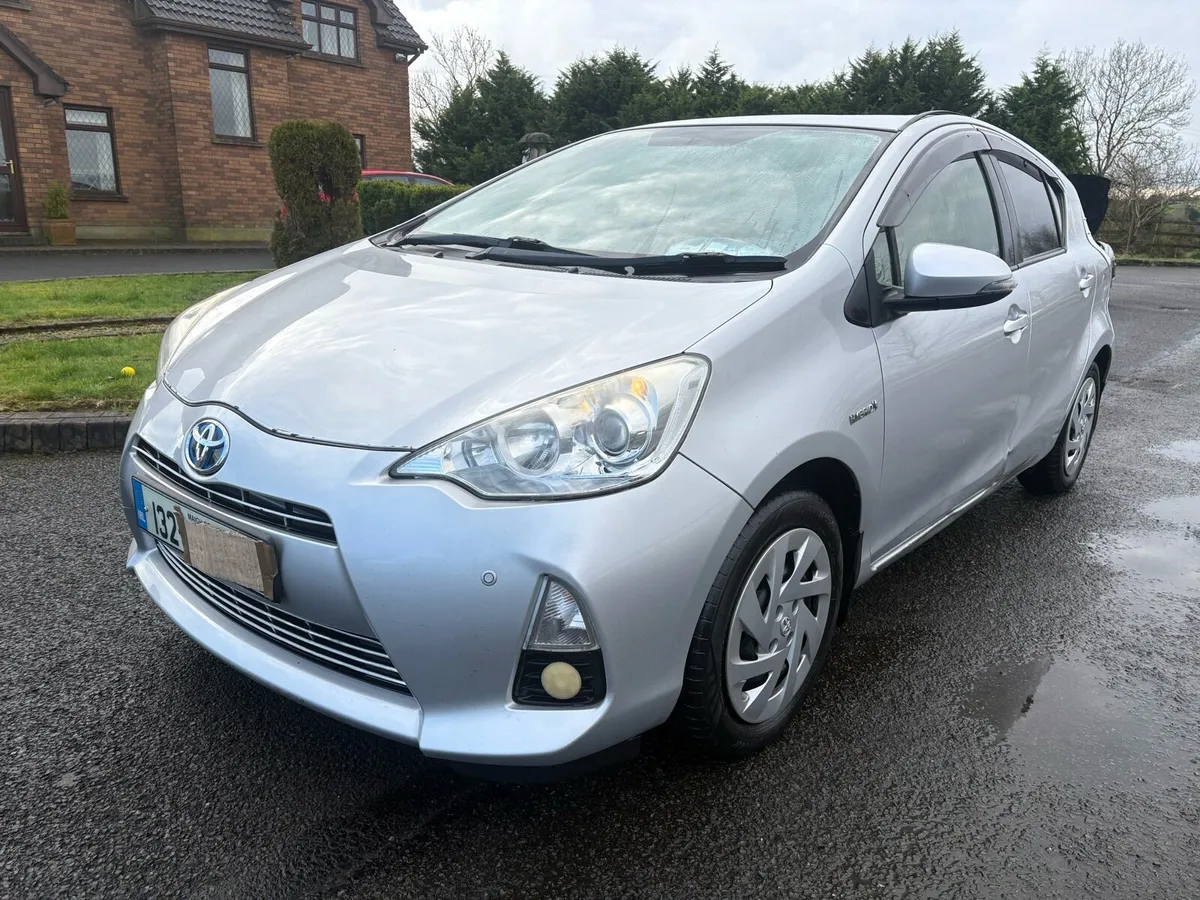 2013 Toyoto Aqua Petrol Hybrid Automatic,Driving - Image 3