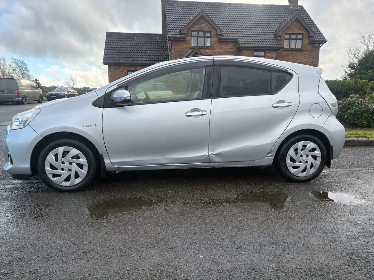 2013 Toyoto Aqua Petrol Hybrid Automatic,Driving - Image 4