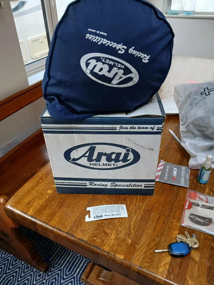 Arai helmet and motorcycle gear - Image 1