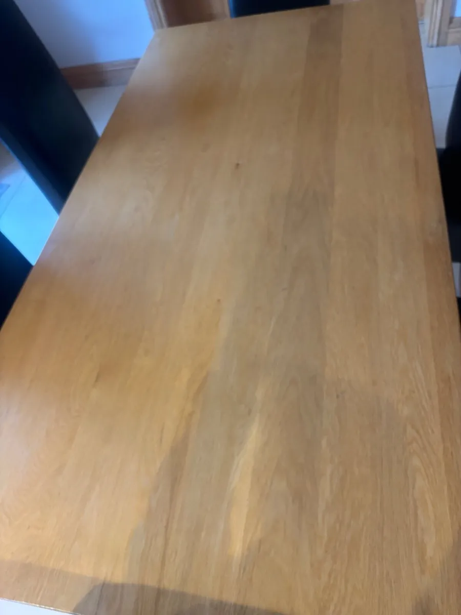 Oak dining table and black leatherette chairs - Image 2