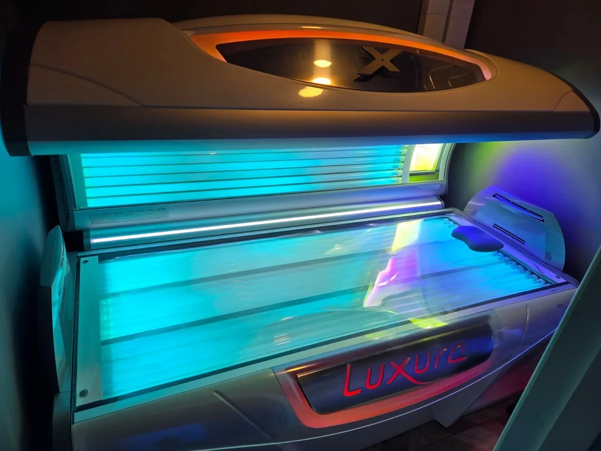 Luxura x7 Lie Down Tanning Bed - Image 1