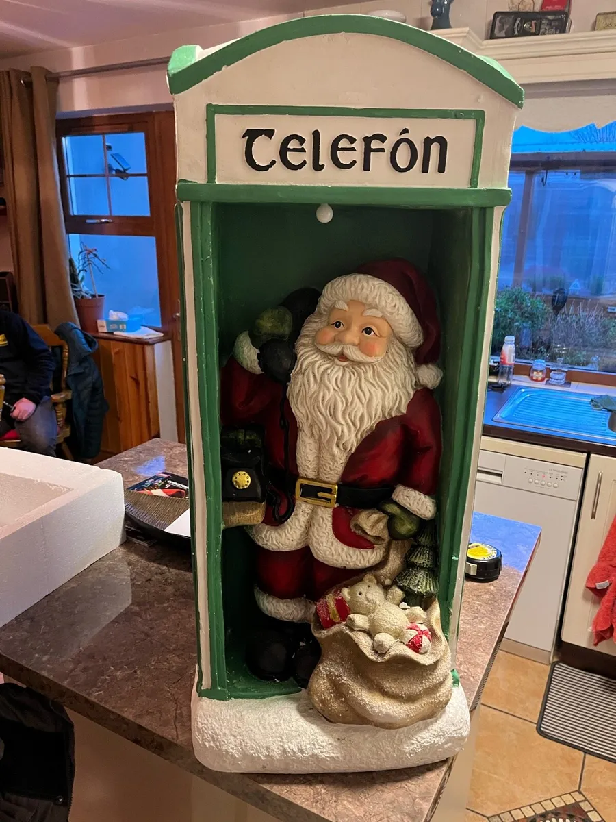 Santa in a phone box - Image 1