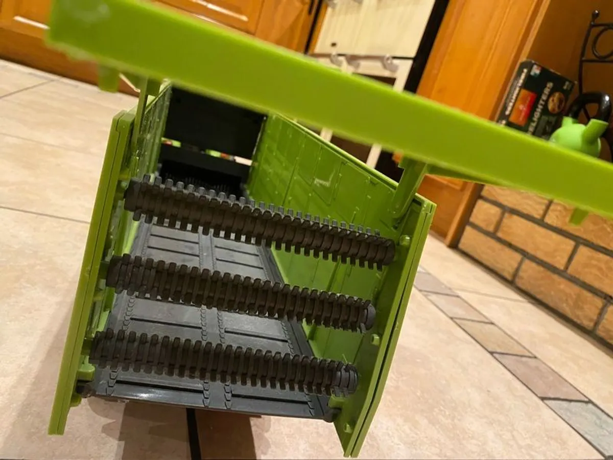 Claas remote control tractor with triable silage wagon - Image 1