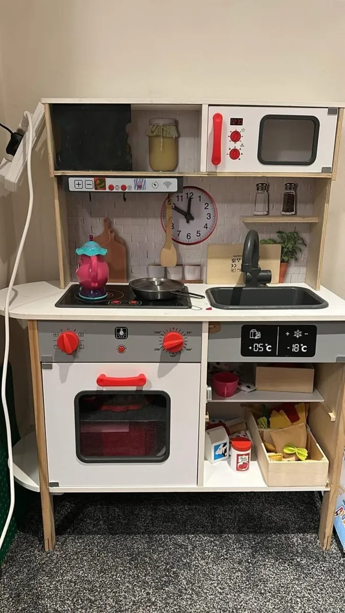 Kids kitchen with lots of accessories