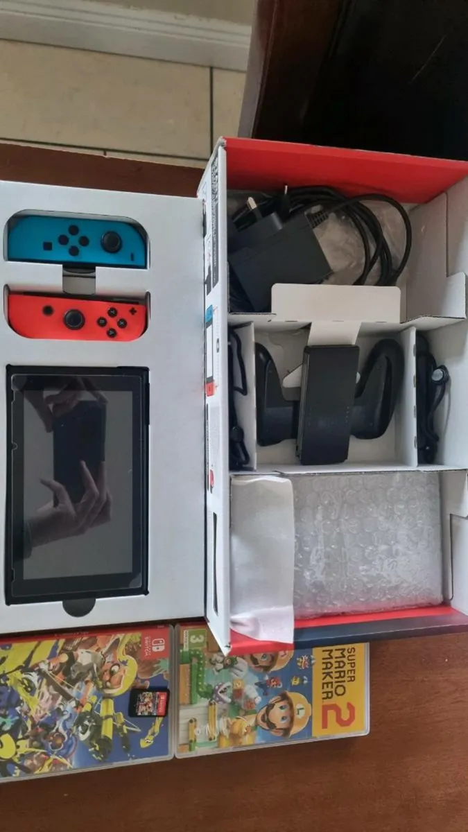 Nintendo Switch with accessories - Image 2
