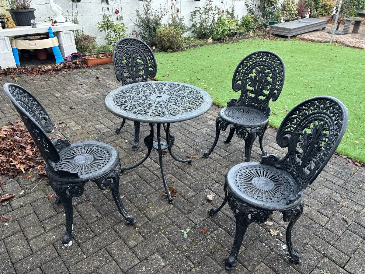 Cast Iron Table and 4 chairs - Image 1