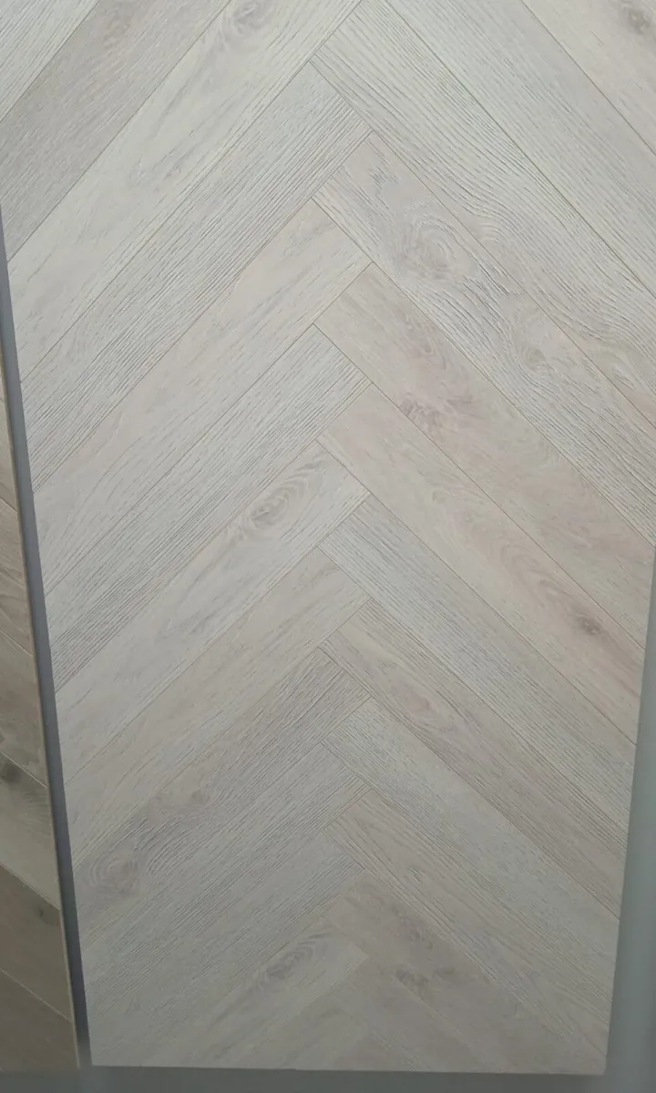 Brand new 12mm herringbone flooring