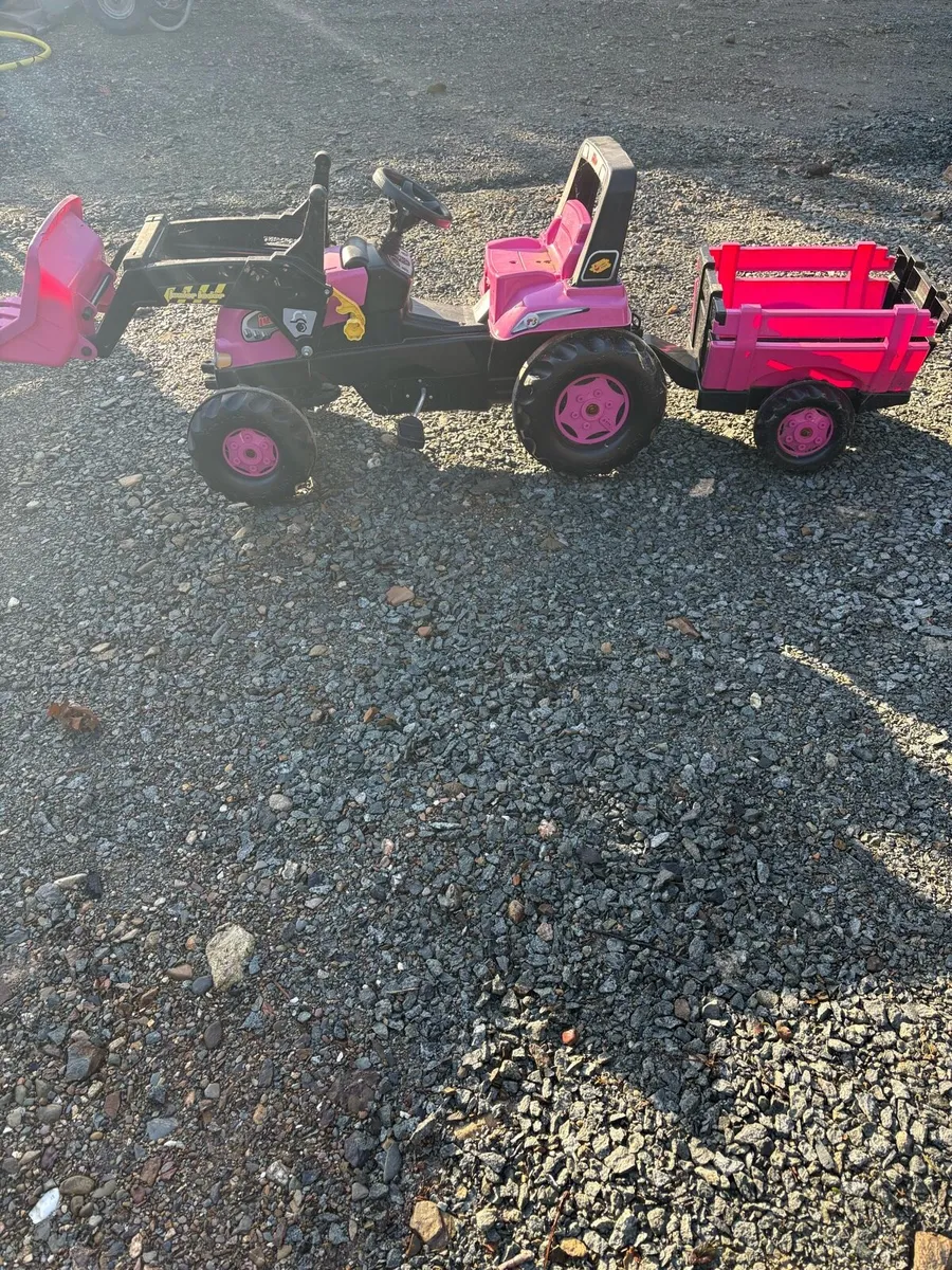 Toy tractor pink with trailer