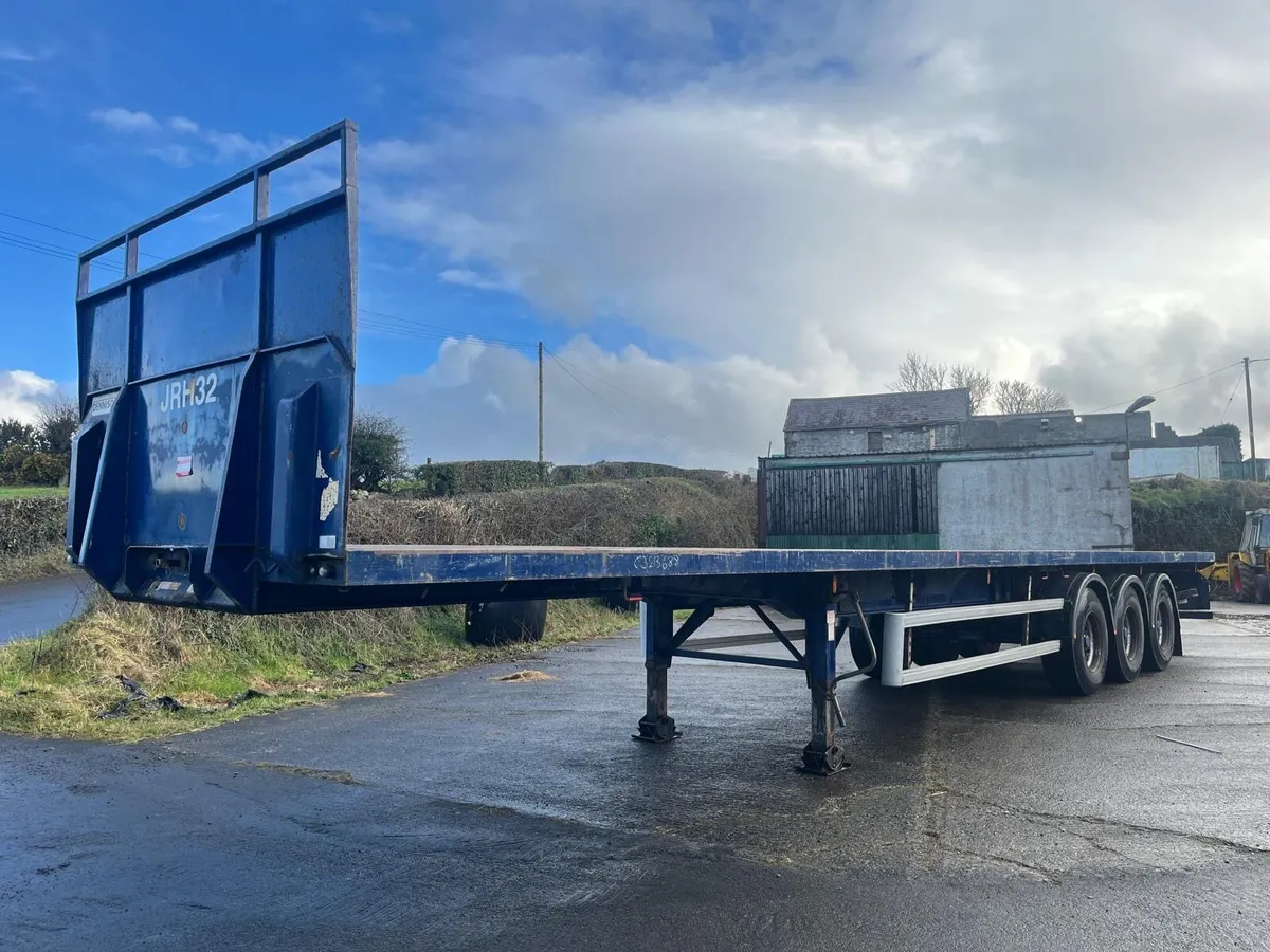 2011 Dennison 13.6MT PSK Flat Trailer - Image 1