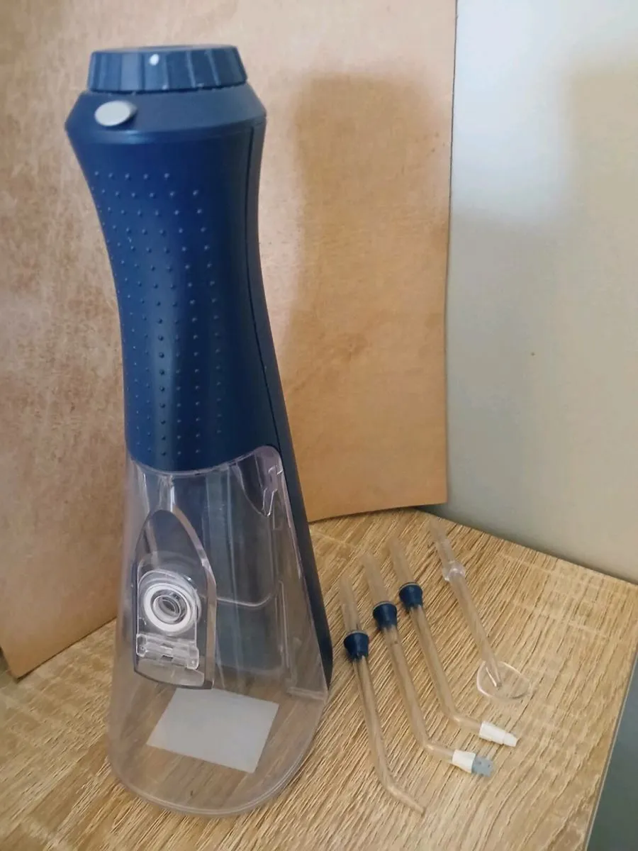 Waterpik  -  Water Flosser  handheld - Image 1