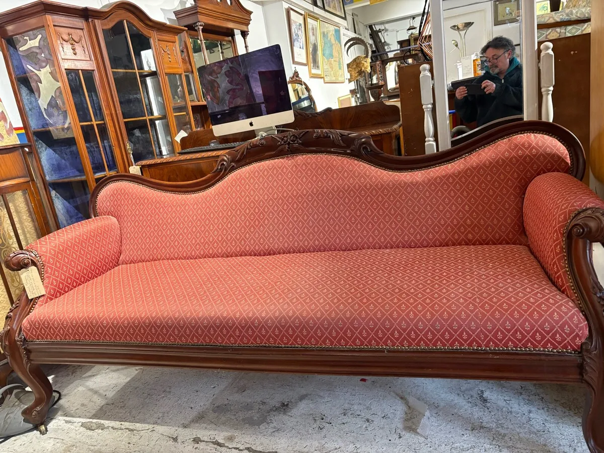 A carved mahogany Empire sofa - Image 1