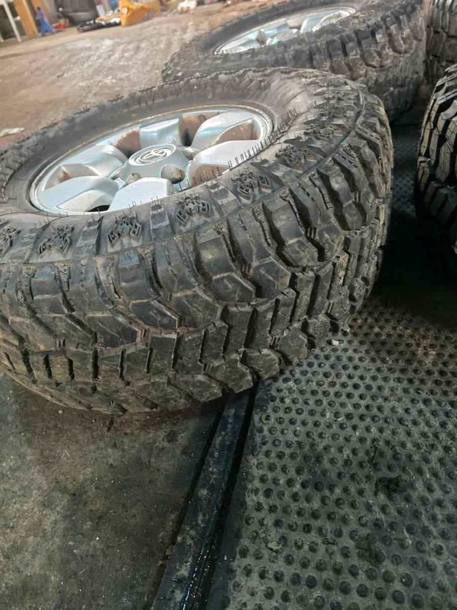 6x139.7 15 inch hilux alloys with mud tyres - Image 3