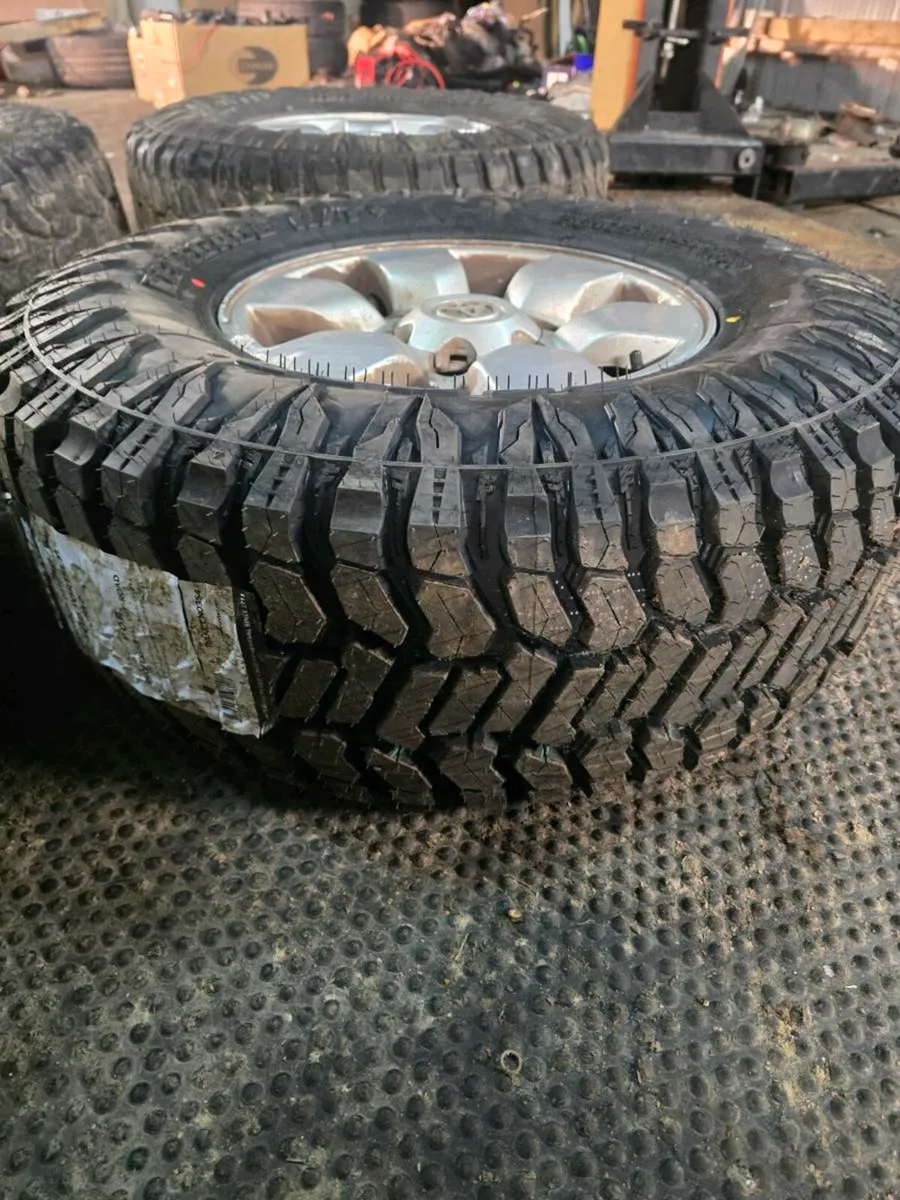 6x139.7 15 inch hilux alloys with mud tyres - Image 2