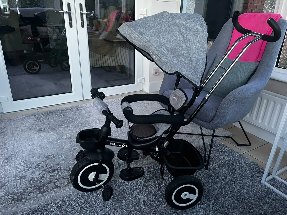 Child’s push tricycle.