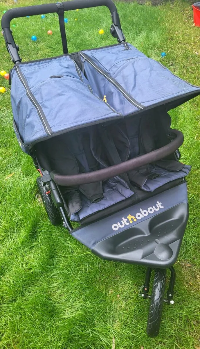 Out N About Double Nipper with Footmuff&Basket - Image 1