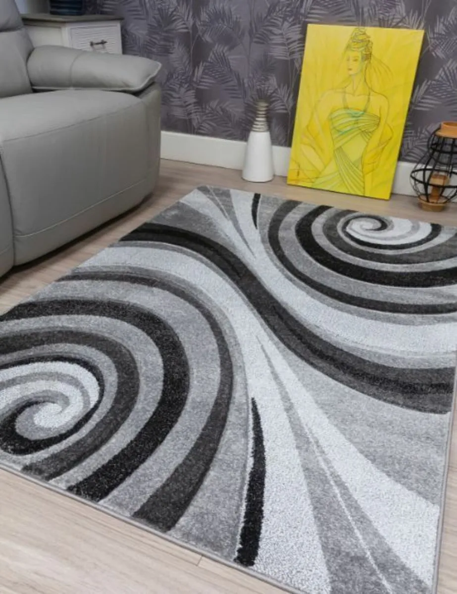 BRAND NEW RUGS - Image 1