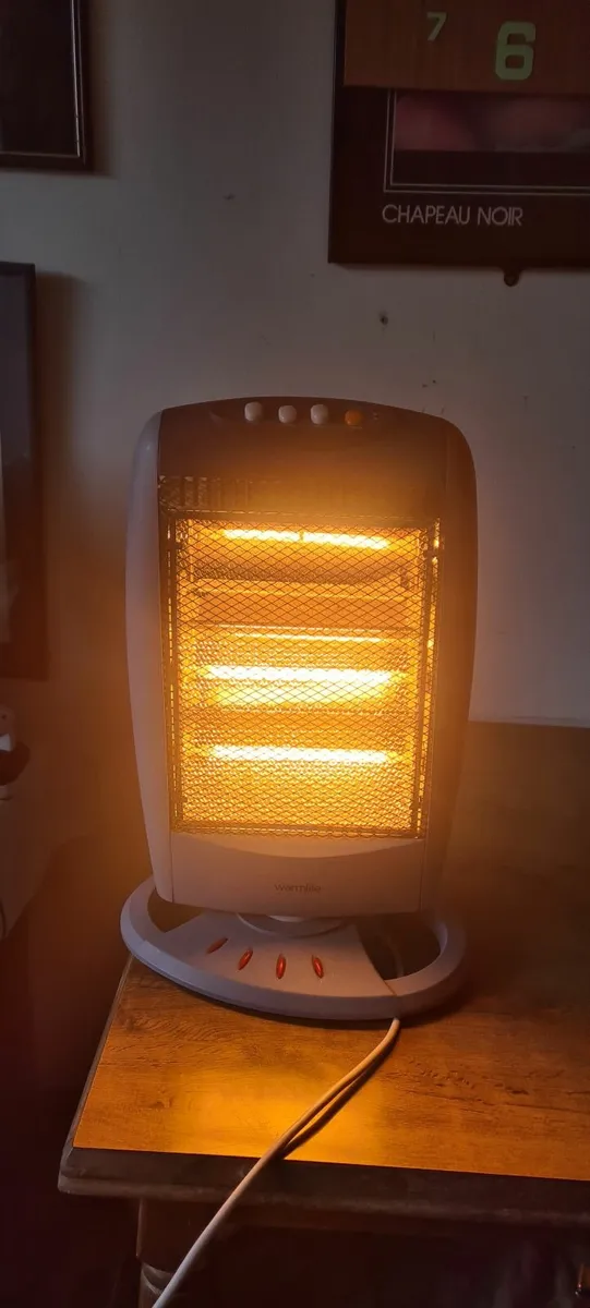 Electric Heater Warmlite 1200kw Hallogen Heater - Image 1