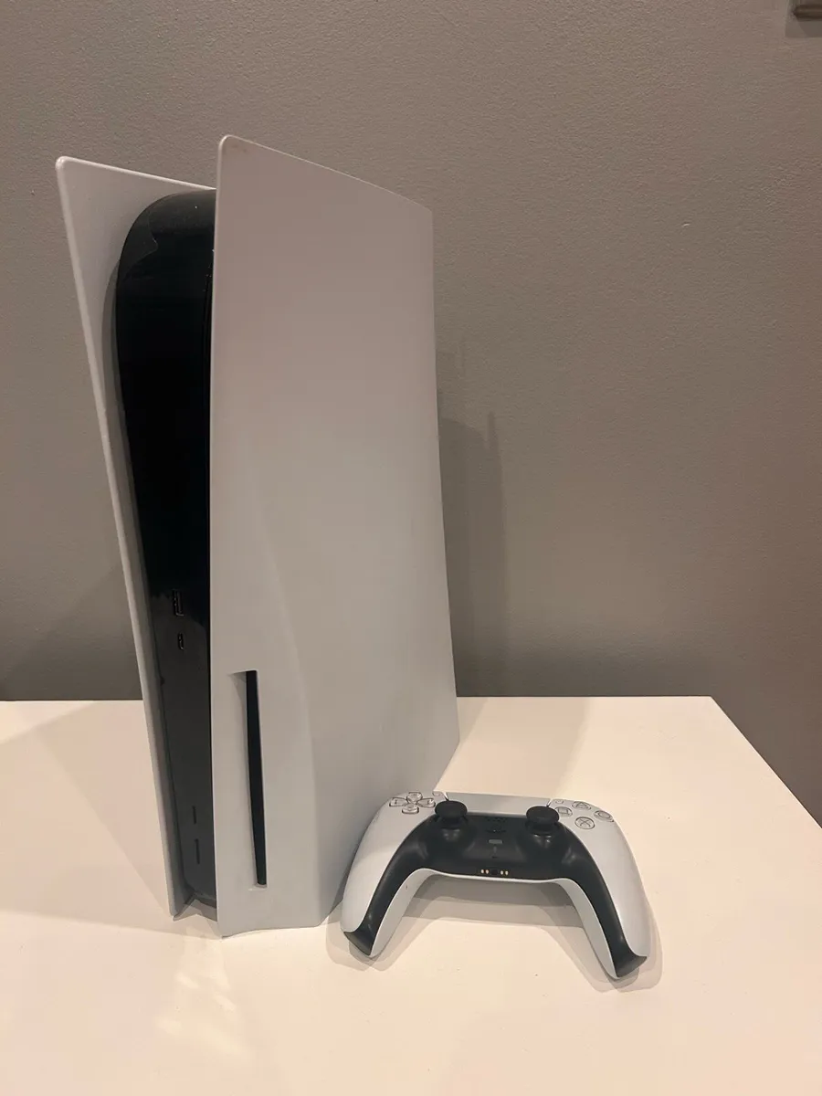 PS5 with controller - Image 1