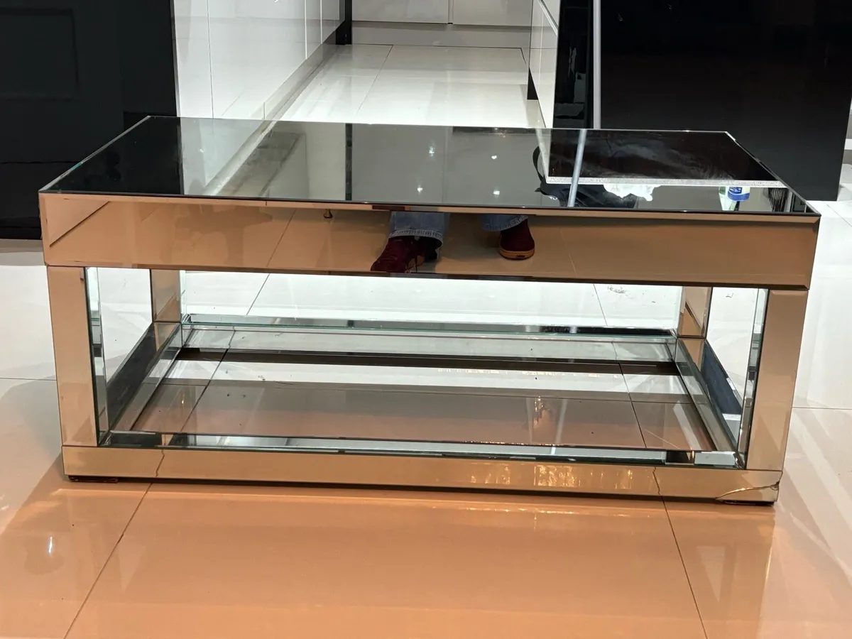 Mirrored coffee table. Sleek modern