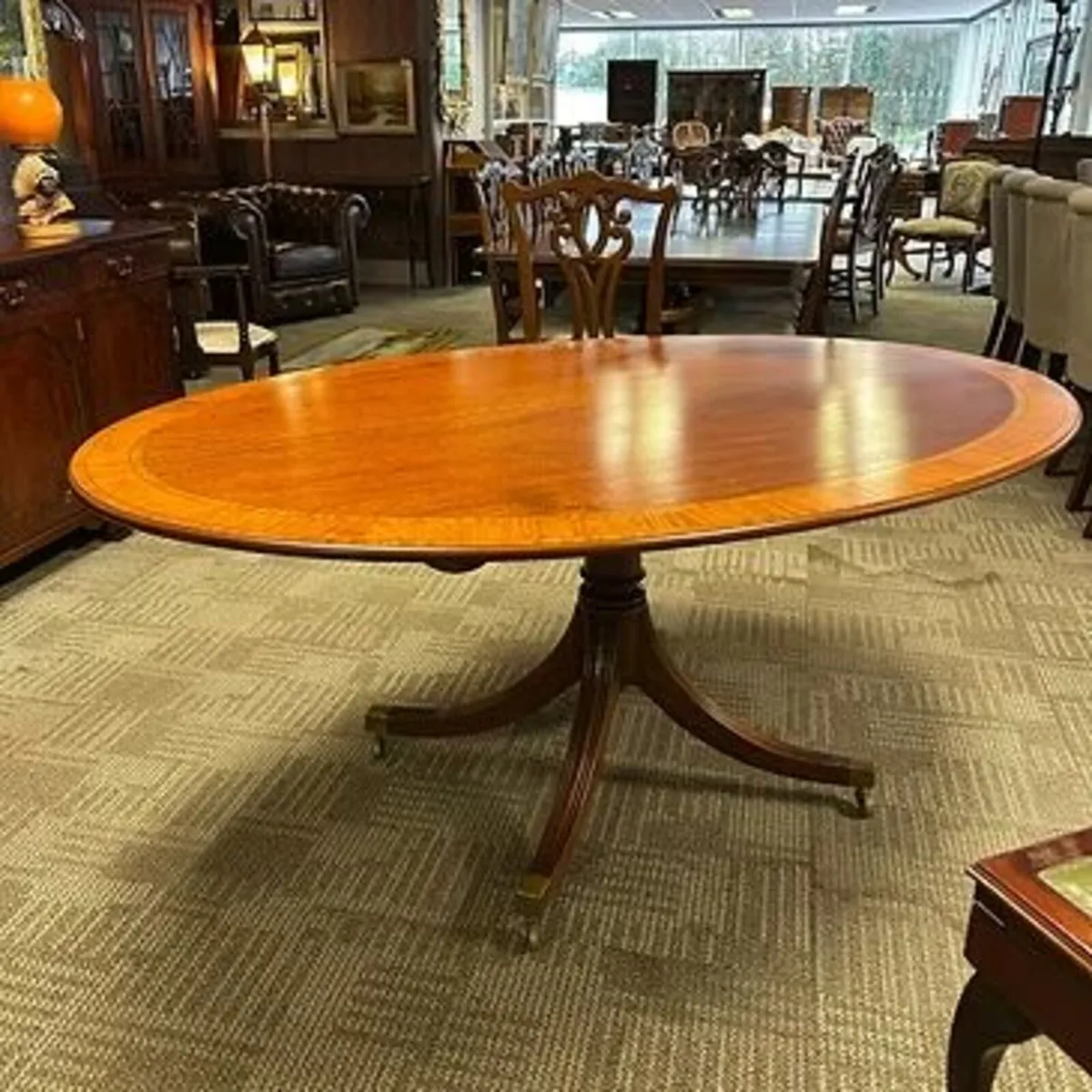 Fabulous oval mahogany inlaid dining table