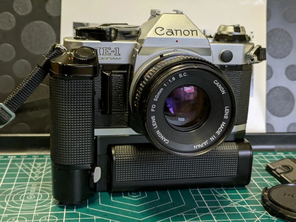 🎞️ Canon AE-1 Program+motor drive grip + 50/1.8 - Image 1
