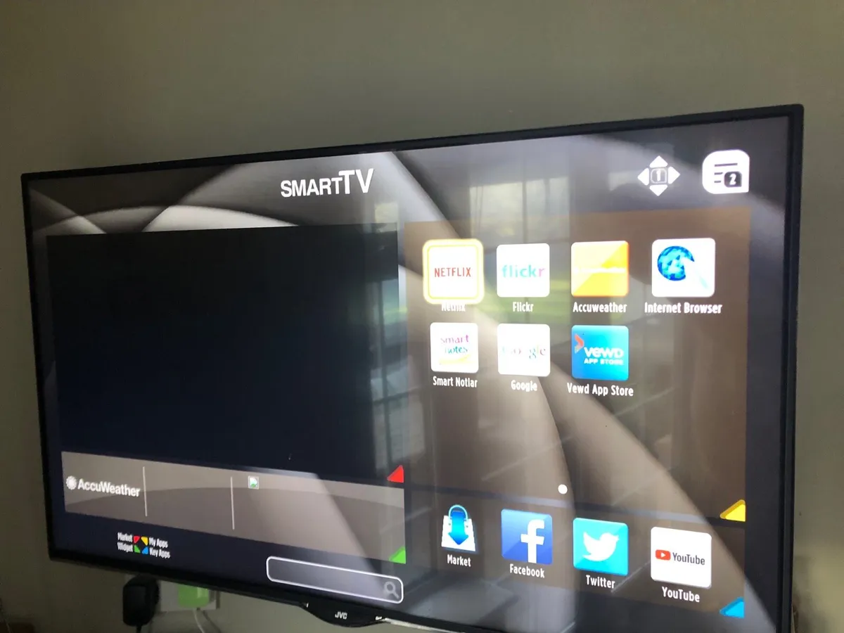 43”JVC Smart Tv and wall bracket - Image 1