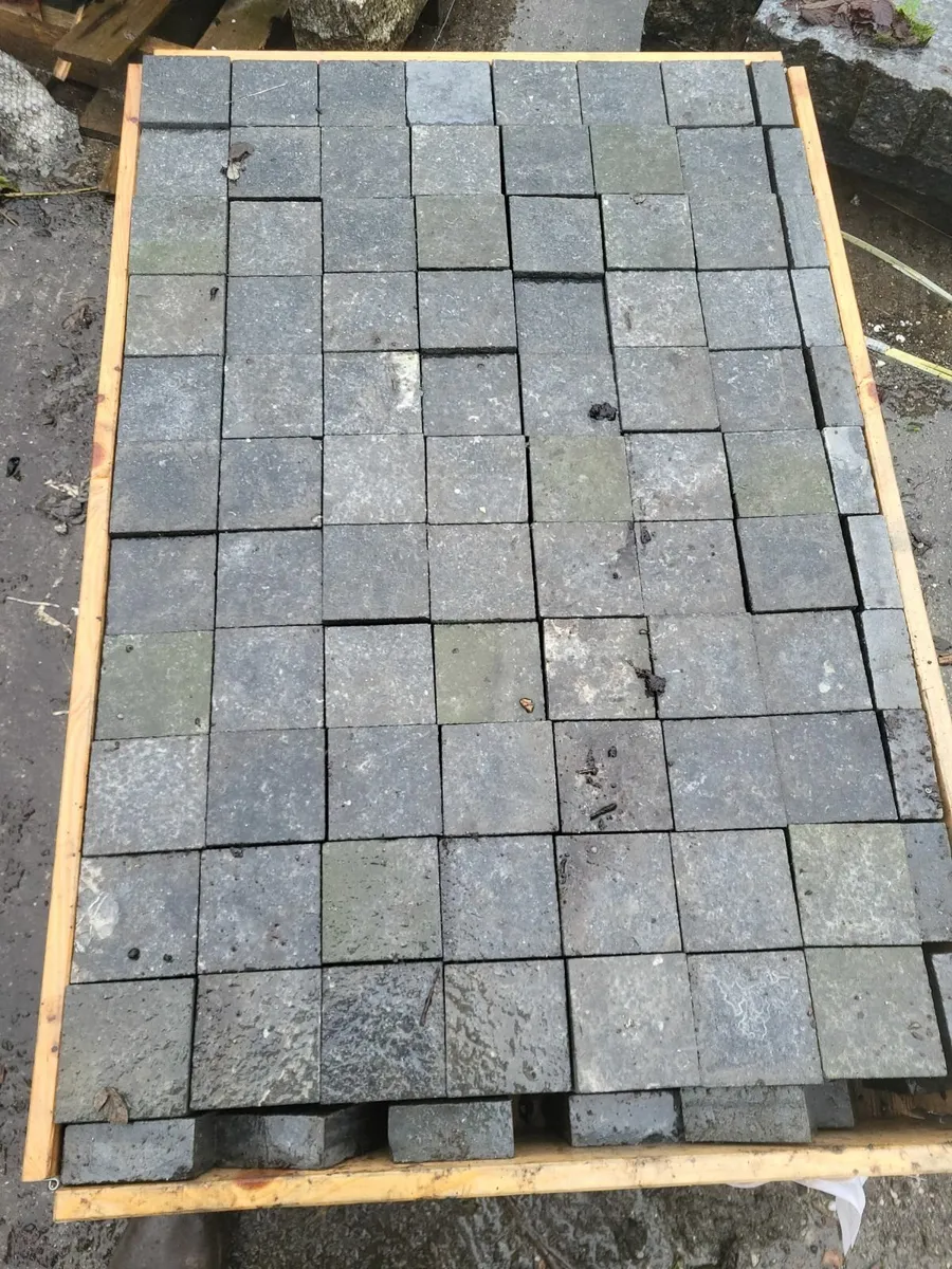 Limestone   sets 2" thick bushhammer  finishes