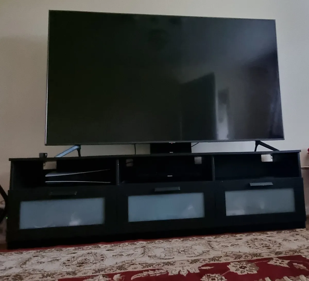 75 inch TV + TV stand - Image 1