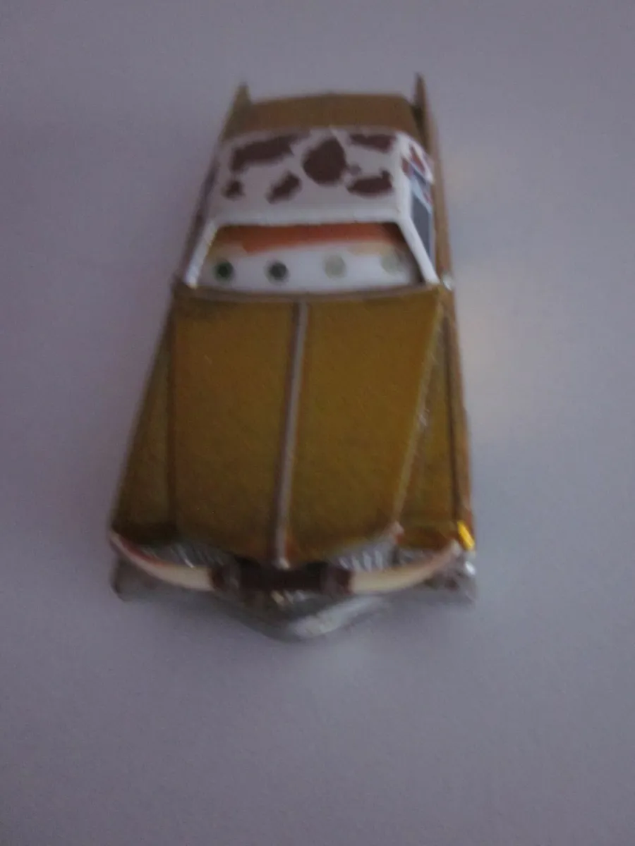 Disney Pixar Cadillac Coupe DeVille Dino Diecast - Image 1