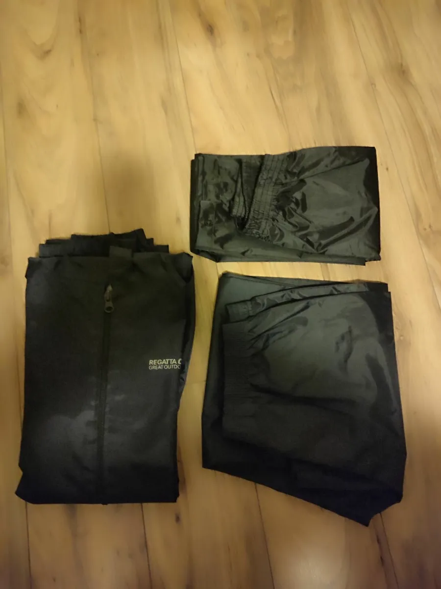 Regatta waterproof rain jacket and trousers x 2 - Image 1