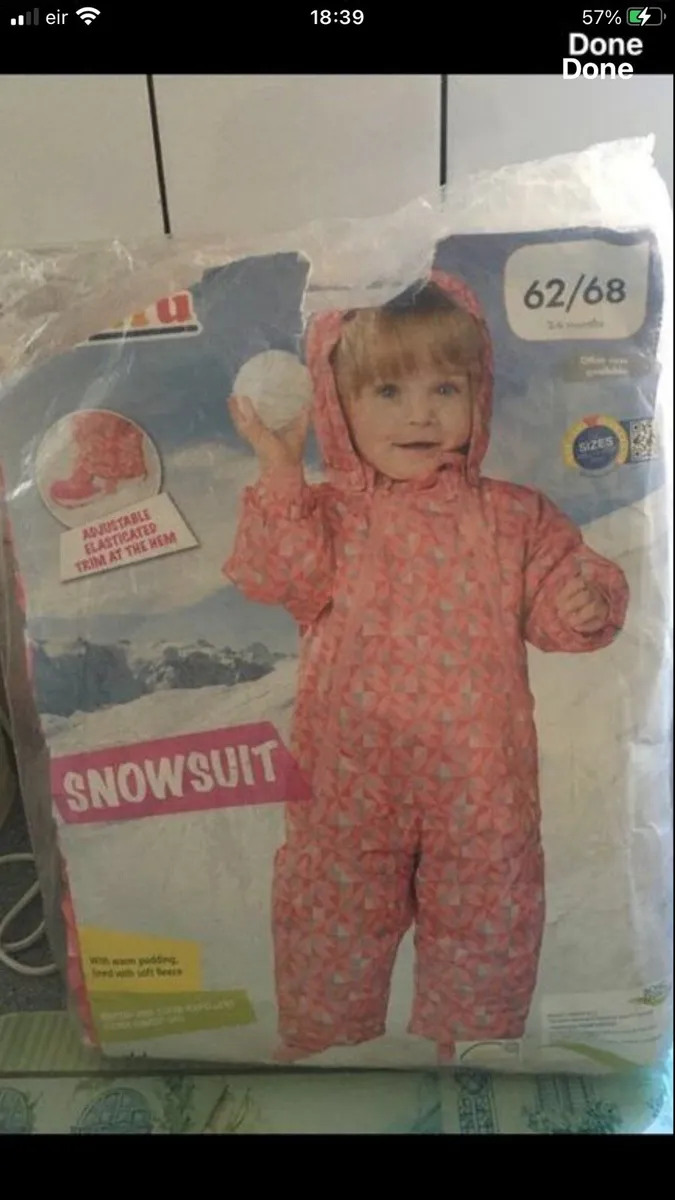 Girls new snowsuit 2/4 mths €10 - Image 1