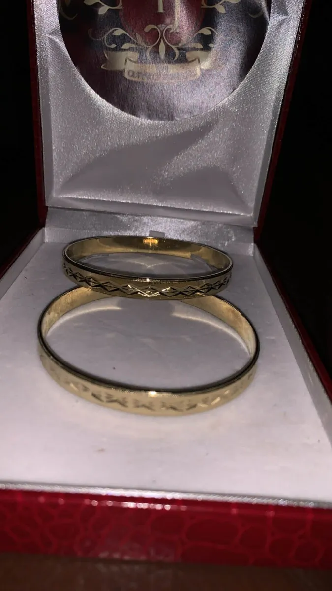 Woman bangles gold plated I think - Image 1